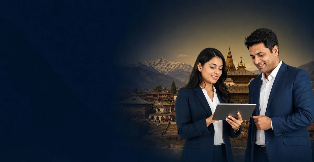 Sigma Nepal consultants reviewing a client website on a tablet in Kathmandu
